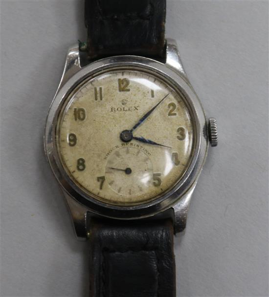 A gentlemans 1940s/1950s stainless steel mid-size Rolex manual wind wrist watch